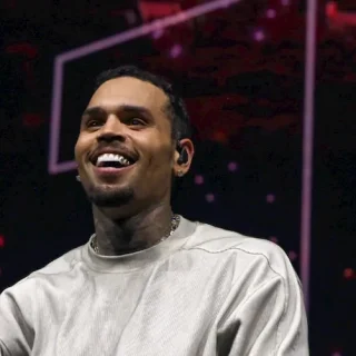 Chris Brown Teeth Before and After: His Dental Transformation chris brown hollywood smile